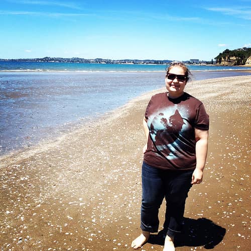 Amy on the beach in New Zealand