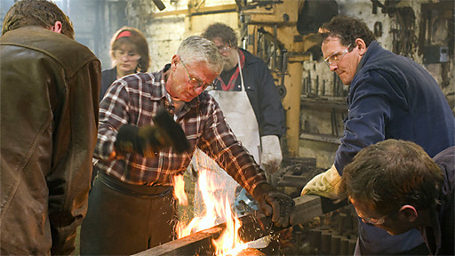 blacksmith forging metal