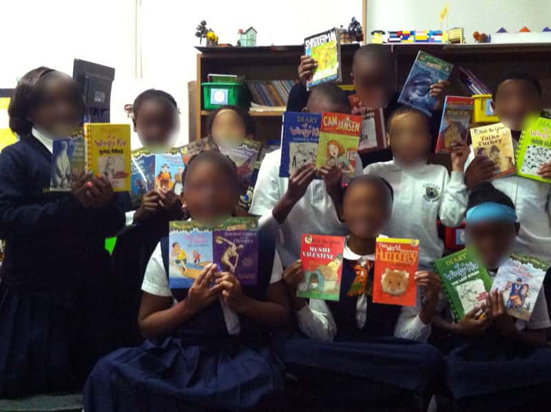 local school kids with donated books