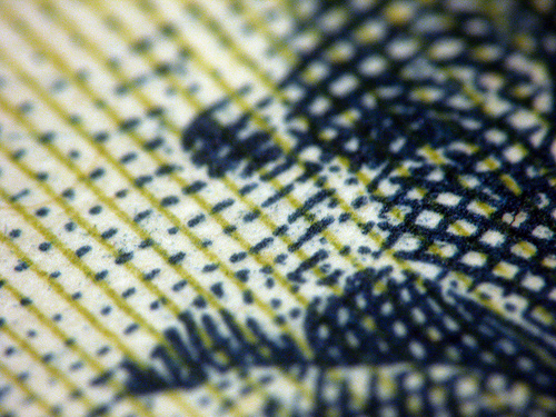 close up of crosshatching on currency